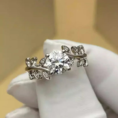 Moissanite and diamond foil ring for women with 18k plated sterling silver and white gold